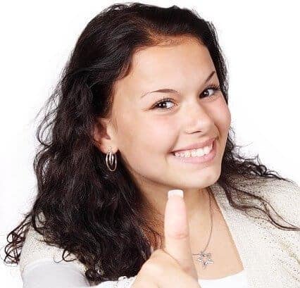 Free stock photo showing a lady who does a "thumbs up"