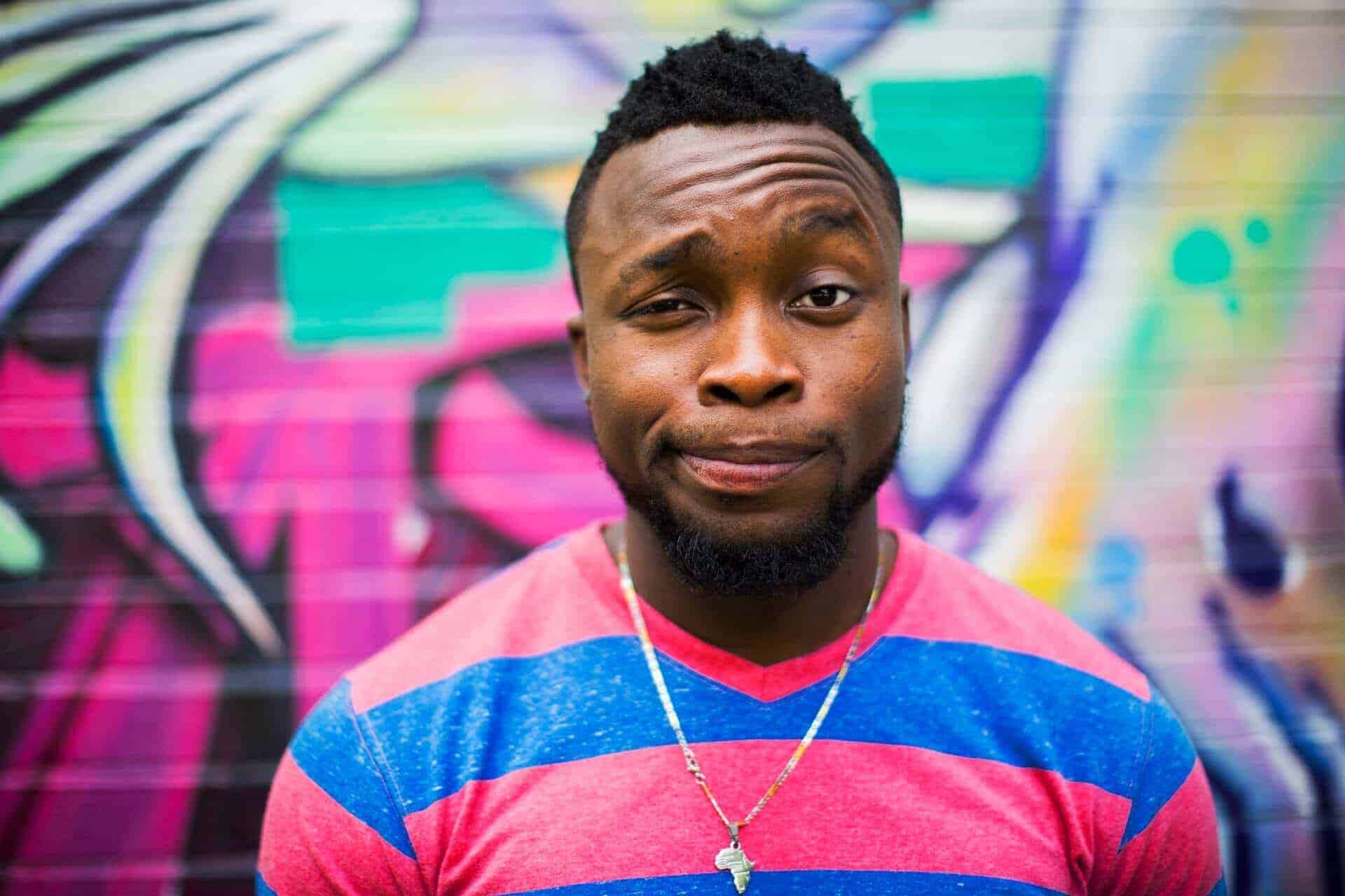 Man humorous in colourful shirt