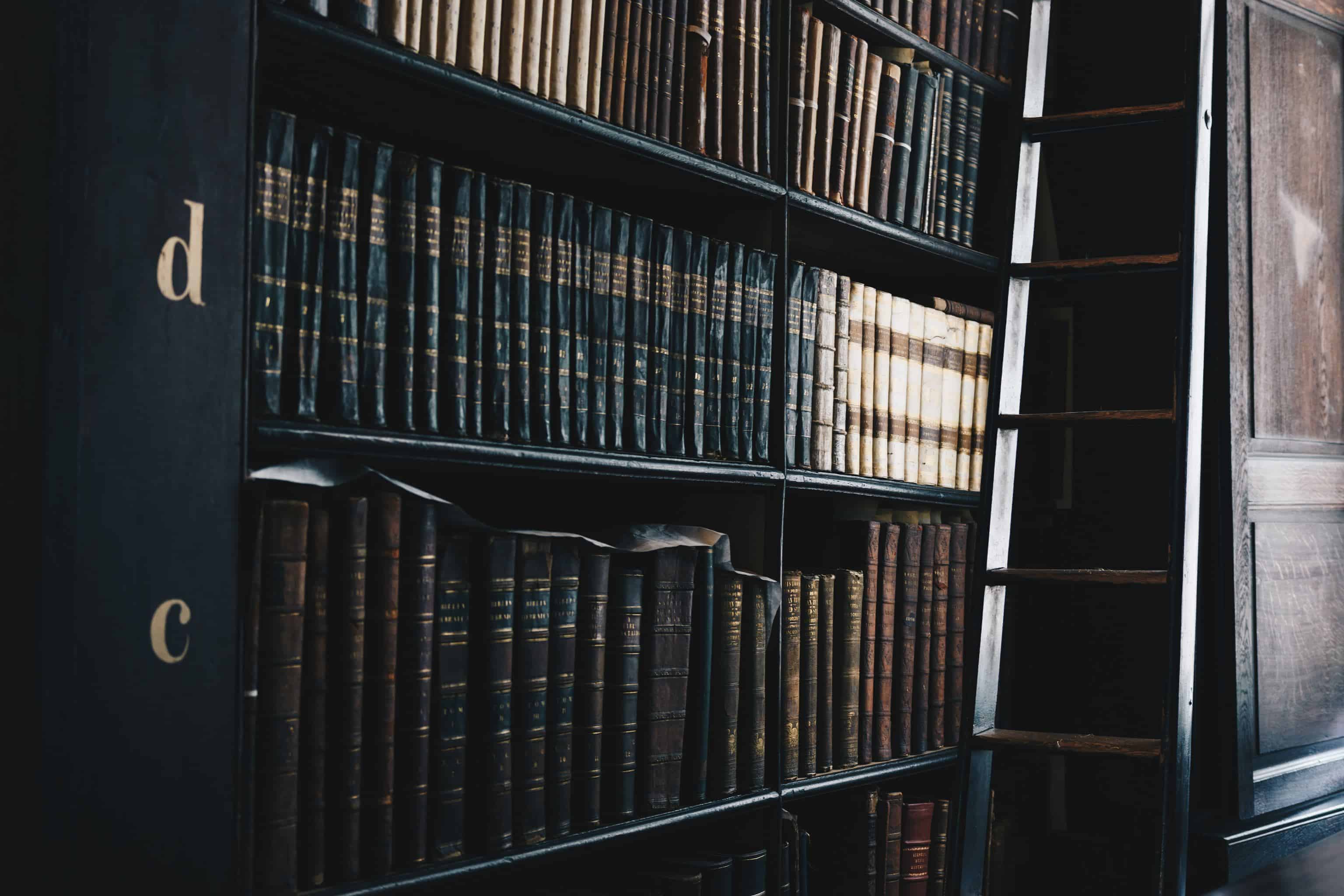 Shelf with books as a symbol for legal texts and jurisprudence